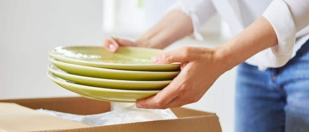 Woman Packing Dinnerware